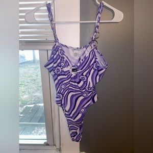 Body suit / jump suit, size medium, NWT.